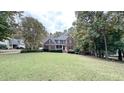 Large front yard with mature trees at 159 Trantham Trl, Clayton, NC 27527