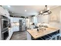 Modern kitchen with stainless steel appliances at 159 Trantham Trl, Clayton, NC 27527