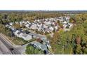 Aerial view of neighborhood with houses and trees at 2125 Star Sapphire Dr, Raleigh, NC 27610