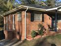 Brick house with a side entrance and landscaping at 308 E East End Ave, Durham, NC 27703