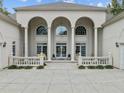 Elegant home exterior featuring a grand entrance and columns at 90118 Hoey, Chapel Hill, NC 27517