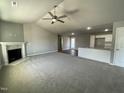 Spacious living room with a fireplace and an open floor plan at 79 Tulipfield Way, Benson, NC 27504