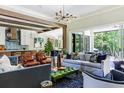 Open living space with stylish furnishings and a view of the backyard at 017 Bartley Holleman Rd # 17, New Hill, NC 27562