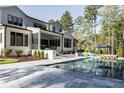 Home's backyard features a large pool and spacious patio area at 017 Bartley Holleman Rd # 17, New Hill, NC 27562