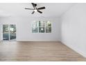 Spacious living room featuring hardwood floors and sliding glass doors at 329 & 331 Roxboro St, Haw River, NC 27258