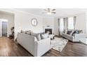 Living room with corner fireplace and ample natural light at 52 E Piston Pt, Clayton, NC 27520