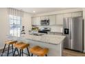 Modern kitchen with granite countertop and island at 233 Holton St, Smithfield, NC 27577