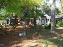 Brick house with columned porch and landscaping at 6349 Elevation Rd, Benson, NC 27504