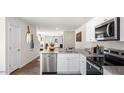 Modern kitchen with granite countertops, stainless steel appliances, and an island at 125 Holmes Corner Dr, Smithfield, NC 27577