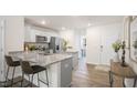 Modern kitchen with granite countertops and island at 131 Holmes Corner Dr, Smithfield, NC 27577