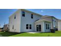 Two-story home with light gray siding and a private patio area at 1071 Cherry Stem Rd, Haw River, NC 27258