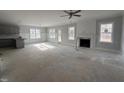 Spacious living room with fireplace and lots of natural light at 613 Tuscany Cir, Princeton, NC 27569