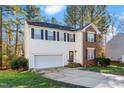 Two-story home with a brick and siding exterior at 104 Full Moon Ct, Garner, NC 27529