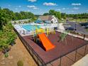 Community pool with adjacent playground for Gathering fun at 190 Nimble Way # 218, Clayton, NC 27520