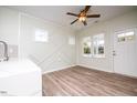 Bright dining area with hardwood floors and modern wall design at 831 Ridgeway Ave, Durham, NC 27701