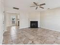 Living room features a fireplace and tile floors at 2129 Ventana Ln, Raleigh, NC 27604