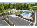 Community pool, clubhouse, and playground at 2215 Pitchfork Ln, Durham, NC 27713