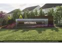 Modern community entrance sign at Sweetbriar with landscaping at 2165 Pink Peony Cir # 230, Durham, NC 27703