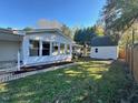 Large backyard with detached workshop/shed at 465 N Dunn St, Angier, NC 27501