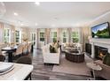 Spacious living room with fireplace and large windows at 204 Shingle Oak Rd, Wake Forest, NC 27587