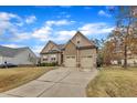 Two-story house with two car garage and landscaped yard at 37 Evie Dr, Smithfield, NC 27577