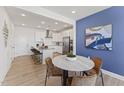Modern kitchen with stainless steel appliances and an island at 10537 Pleasant Branch Dr # 101, Raleigh, NC 27614