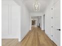 Elegant hallway with hardwood floors and recessed lighting at 2637 Trifle Ln, Wake Forest, NC 27587