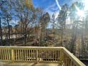 Deck overlooking a wooded area with mature trees at 1308 Alston Landing Way # 13, Cary, NC 27519