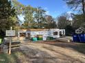 House under construction, framing visible, lot clearing underway at 4804 Deerwood Dr, Raleigh, NC 27529