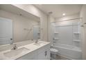 Bathroom boasts double vanity, shower, and bathtub at 7622 Michelle Rd, Rocky Mount, NC 27803