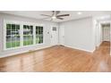 Bright living room with hardwood floors and lots of natural light at 2112 Eastwood Dr, Durham, NC 27703