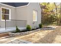 Updated landscaping and stonework create curb appeal at 2703 Augusta Dr, Durham, NC 27707