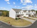 Townhome community view, showcasing a well-maintained property at 303 Old Castle Dr, Morrisville, NC 27560