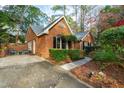 Brick home with a patio and walkway at 402 Berryhill Dr, Carrboro, NC 27510