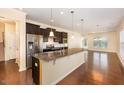 Spacious kitchen with granite countertops and stainless steel appliances at 219 Rosedale Creek Dr, Durham, NC 27703