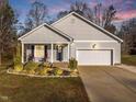 Charming one-story home with covered front porch at 50 Timber Ct, Spring Hope, NC 27882