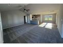 Spacious living room with vaulted ceiling and carpet at 198 Pate Landing Dr, Selma, NC 27576