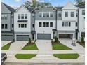 Modern townhouses with two-car garages at 4505 Mint Leaf Ln, Raleigh, NC 27612