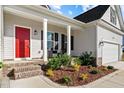 Front porch with red door and brick steps at 80 Black Oak Pl, Spring Lake, NC 28390