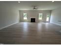 Spacious living room with fireplace and lots of natural light at 120 Lemon Drop Ln, Franklinton, NC 27525