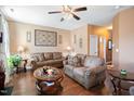 Living room with hardwood floors and comfortable seating at 2517 Shepherd Valley St, Raleigh, NC 27610