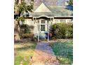 House exterior showcasing a brick pathway leading to the front entrance at 504 Summitt Dr, Sanford, NC 27330