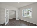 Spacious office featuring wood-look floors and a large window at 1136 Middlecrest Dr, Rocky Mount, NC 27804
