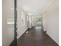 Bright and spacious entryway with dark hardwood floors at 516 Lemon Daisy Ln, Knightdale, NC 27545