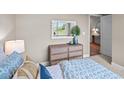 Charming bedroom with a dresser and access to another room at 40 Saddle Mare St, Clayton, NC 27520