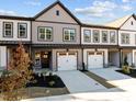 Two-story townhome featuring a neutral color palette and attached garage at 509 Excelsior Ct, Rolesville, NC 27587