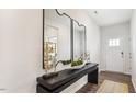 Bright entryway with console table, mirrors, and stylish decor at 60 Fair Child Rd, Spring Lake, NC 28390