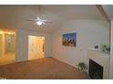 Open living room with kitchen and hallway access at 11321 Involute Pl # 102, Raleigh, NC 27617