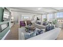 Open living room, hardwood floors, and kitchen view at 1235 Shaw View Alley # 201, Raleigh, NC 27601