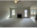 Spacious living room featuring a fireplace and high ceilings at 172 Tulipfield Way, Benson, NC 27504